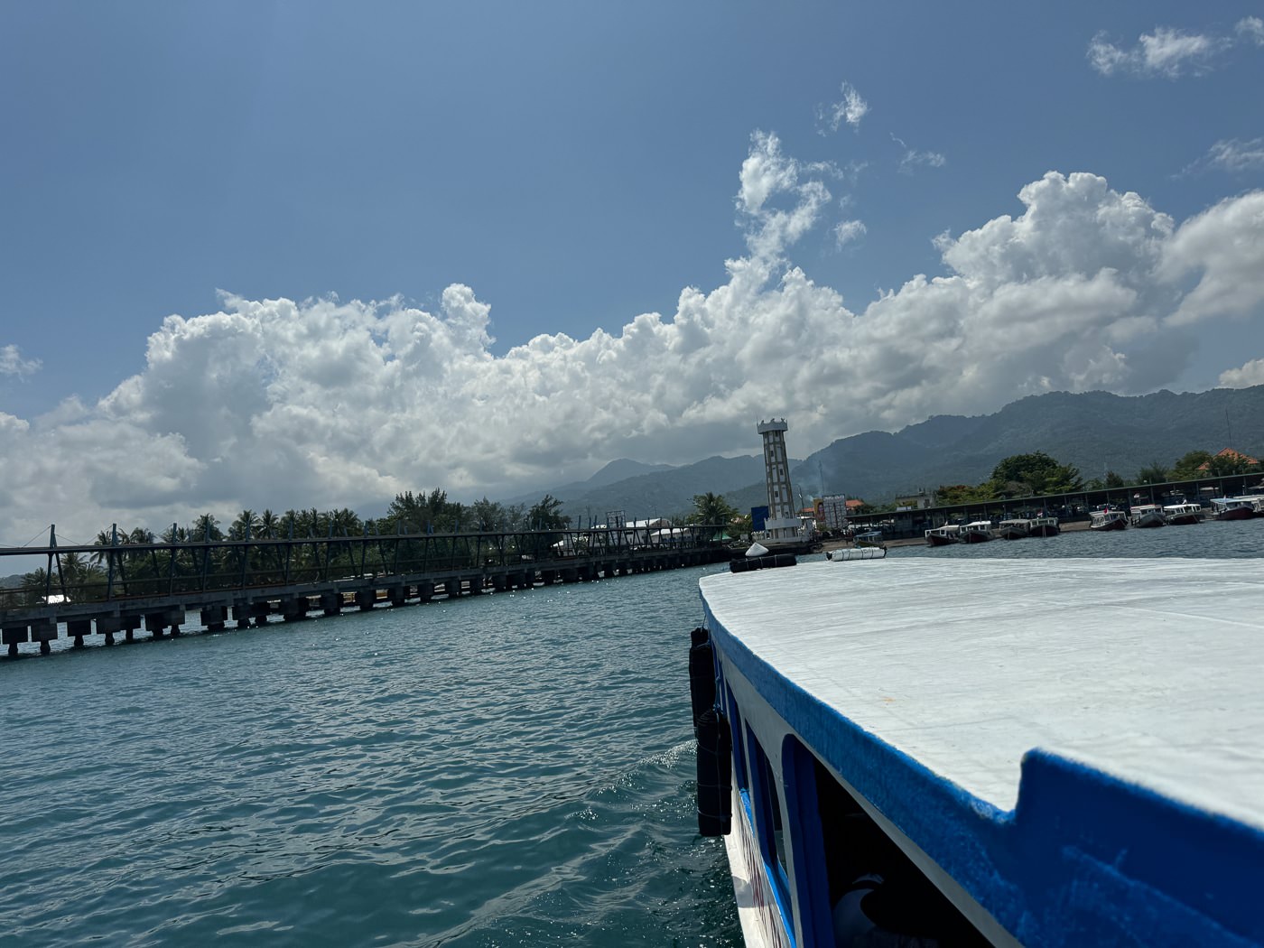 Senggigi Beach: An Honest Guide to Lombok's Old Hub 6 Boats and the pier at Bangsal Harbour, 30 minutes north of Senggigi