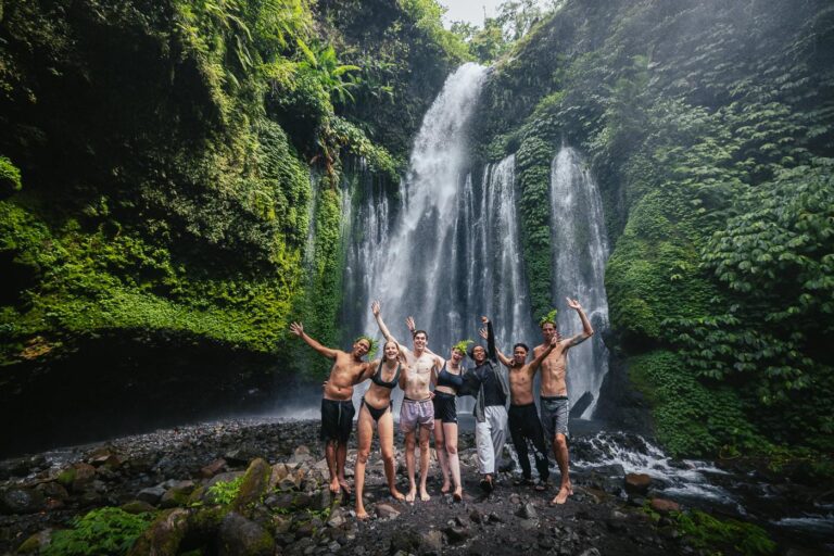 Travelers at Tiu Kelep Waterfall